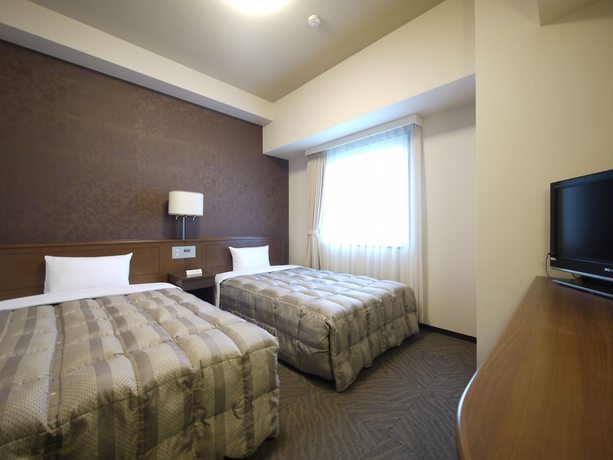 Imagen de la habitación del Hotel Route-inn Fukui Ekimae. Foto 14