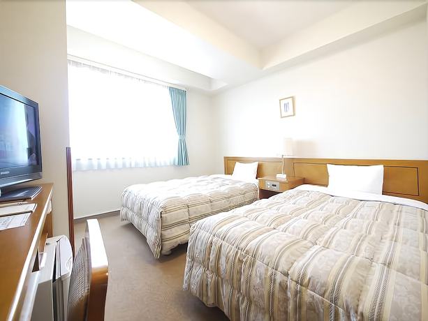 Imagen de la habitación del Hotel Route-inn Fukuioowada. Foto 11