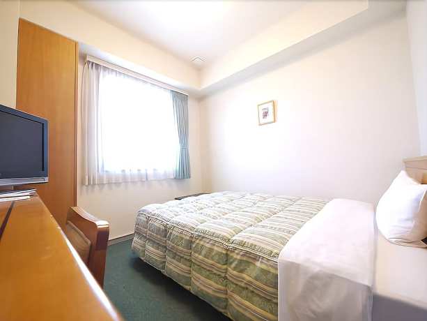 Imagen de la habitación del Hotel Route-inn Fukuioowada. Foto 12