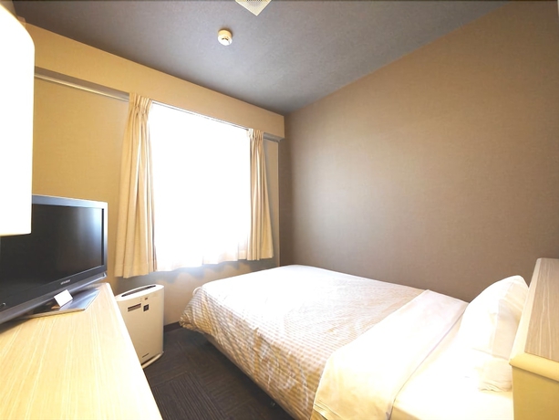 Imagen de la habitación del Hotel Route-inn Kitamatsudo Ekimae. Foto 11