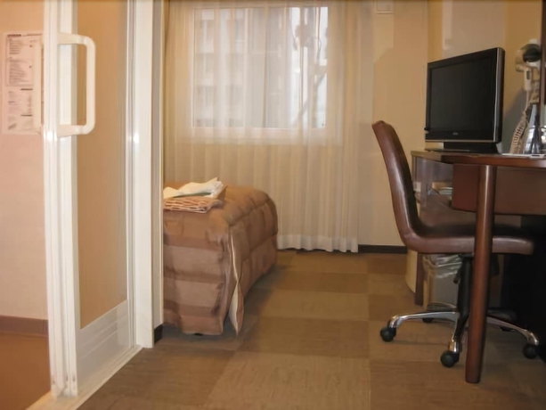 Imagen de la habitación del Hotel Route-inn Sendaiko Kita Inter. Foto 12
