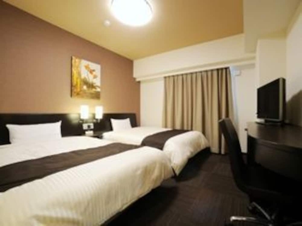 Imagen de la habitación del Hotel Route-inn Sendaiko Kita Inter. Foto 13