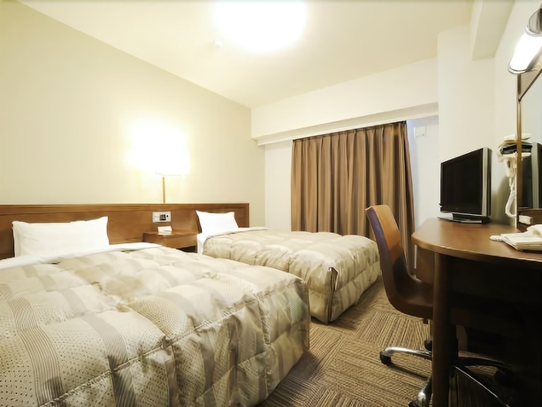 Imagen de la habitación del Hotel Route-inn Sendaiko Kita Inter. Foto 14
