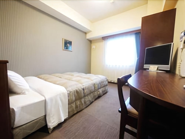 Imagen de la habitación del Hotel Route-inn Tosu Ekimae. Foto 2