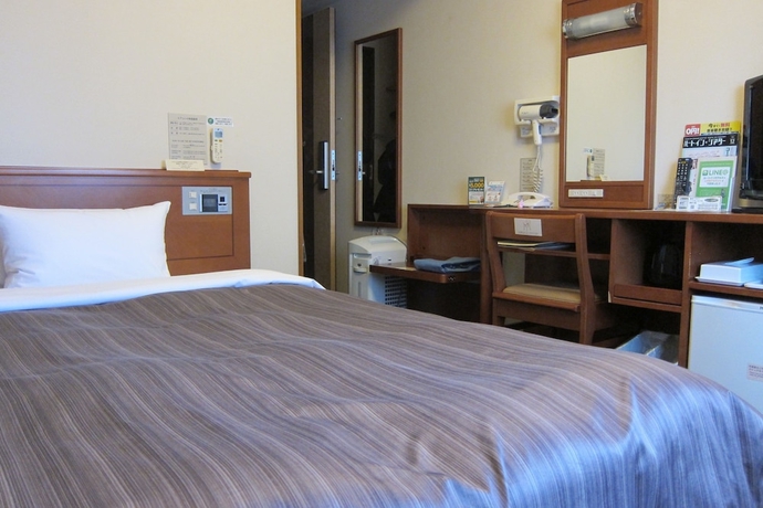 Imagen de la habitación del Hotel Route-inn Tosu Ekimae. Foto 11