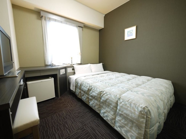 Imagen de la habitación del Hotel Route-inn Toyama Ekimae. Foto 11