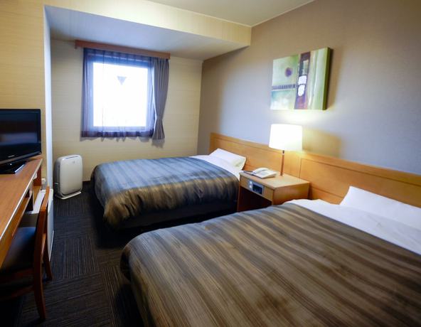 Imagen de la habitación del Hotel Route-inn Tsuruoka Inter. Foto 7