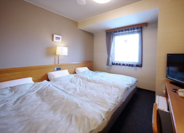 Imagen de la habitación del Hotel Route-inn Tsuruoka Inter. Foto 9