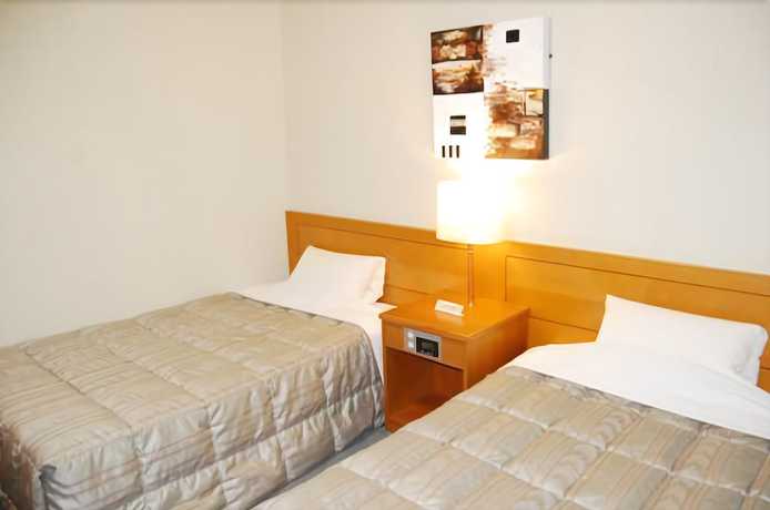 Imagen de la habitación del Hotel Route-inn Tsuruoka Inter. Foto 11