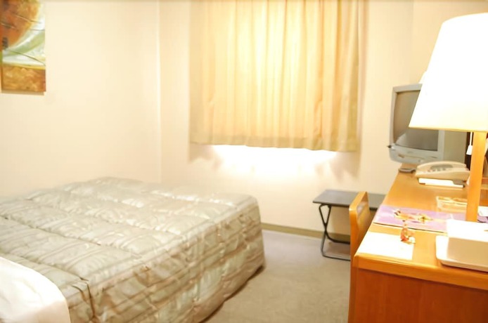 Imagen de la habitación del Hotel Route-inn Tsuruoka Inter. Foto 12