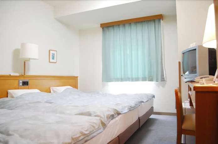 Imagen de la habitación del Hotel Route-inn Tsuruoka Inter. Foto 13