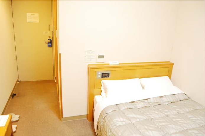 Imagen de la habitación del Hotel Route-inn Tsuruoka Inter. Foto 15