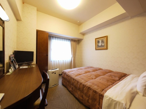 Imagen de la habitación del Hotel Route-inn Yokohama Bashamichi. Foto 4