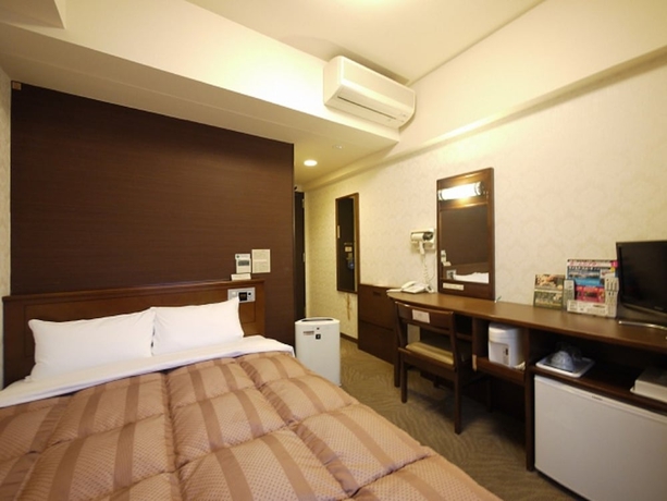 Imagen de la habitación del Hotel Route-inn Yokohama Bashamichi. Foto 8