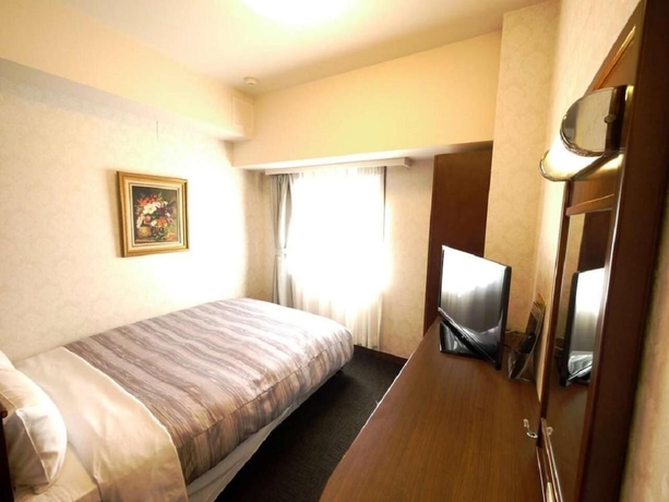 Imagen de la habitación del Hotel Route-inn Yokohama Bashamichi. Foto 14