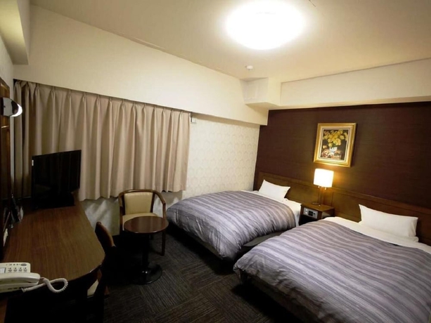 Imagen de la habitación del Hotel Route-inn Yokohama Bashamichi. Foto 15