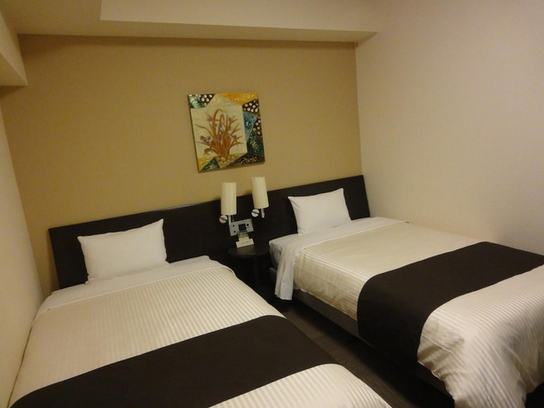 Imagen de la habitación del Hotel Route-inn Yokohama Bashamichi. Foto 16