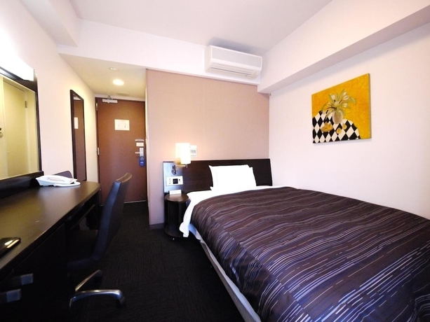 Imagen de la habitación del Hotel Route-inn Yokohama Bashamichi. Foto 17