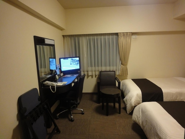 Imagen de la habitación del Hotel Route-inn Yokohama Bashamichi. Foto 18