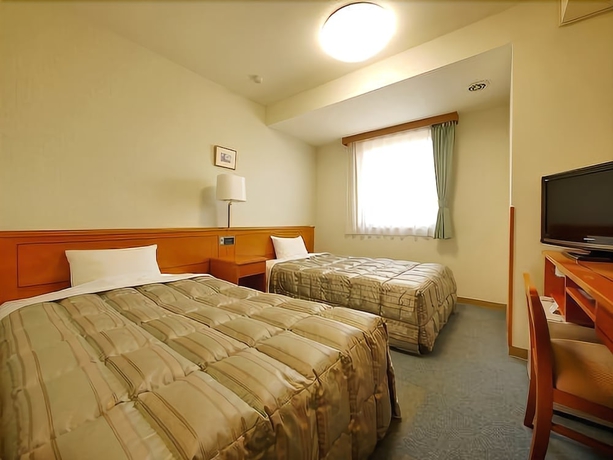 Imagen de la habitación del Hotel Route-inn Yonezawa Ekihigashi. Foto 11