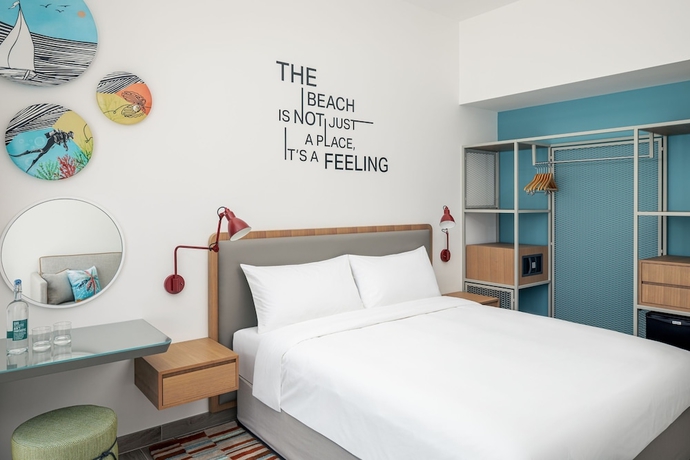 Imagen de la habitación del Hotel Rove Al Marjan Island. Foto 2
