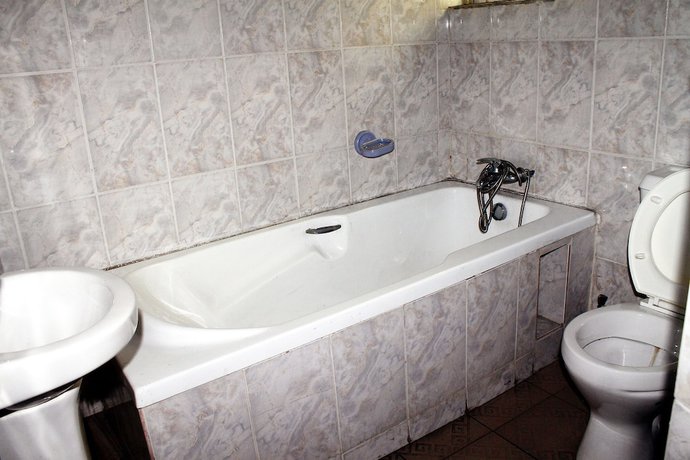 Imagen de la habitación del Hotel Row and Suites. Foto 17