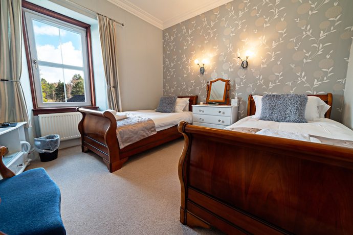 Imagen de la habitación del Hotel Rowan Tree Country. Foto 4