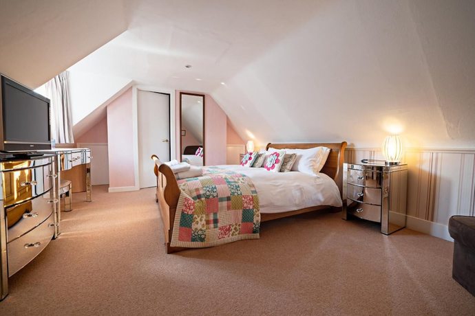 Imagen de la habitación del Hotel Rowan Tree Country. Foto 9