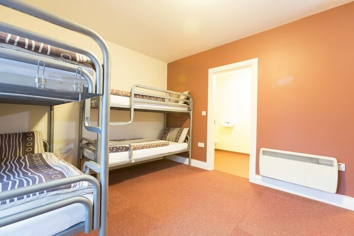 Imagen de la habitación del Hotel Rowan Tree Hostel. Foto 20