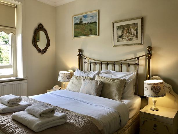 Imagen de la habitación del Hotel Rowley Manor. Foto 11