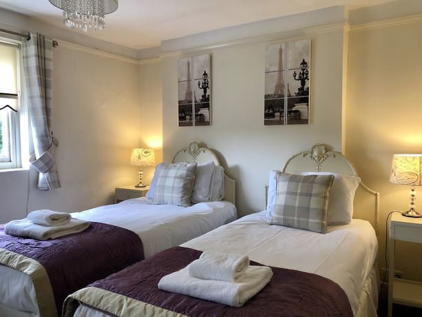 Imagen de la habitación del Hotel Rowley Manor. Foto 13