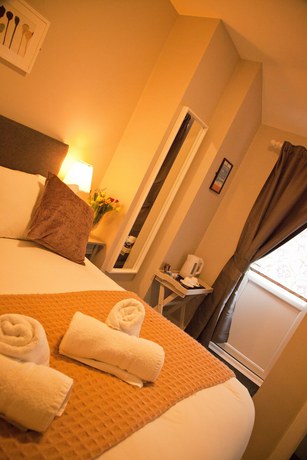Imagen de la habitación del Hotel Rowton Poplars. Foto 11