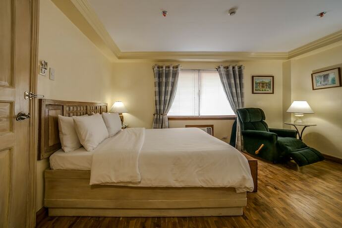 Imagen de la habitación del Hotel Roxas President's Inn. Foto 17
