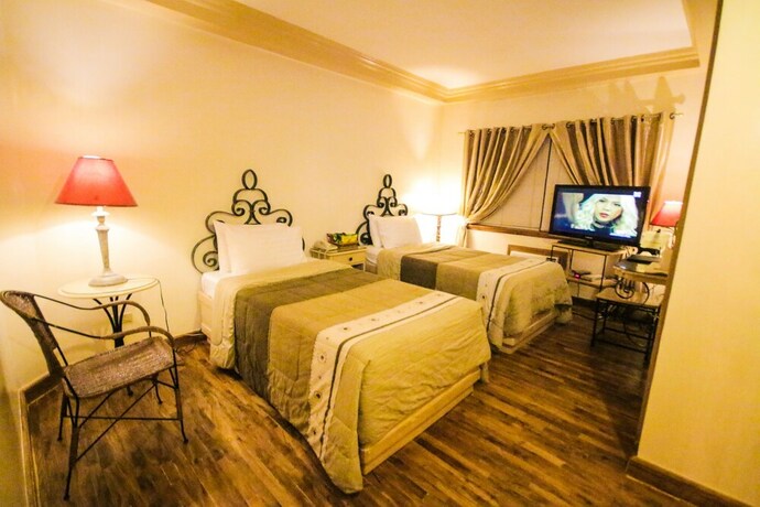 Imagen de la habitación del Hotel Roxas President's Inn. Foto 18