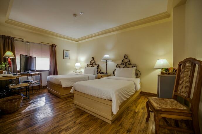 Imagen de la habitación del Hotel Roxas President's Inn. Foto 22