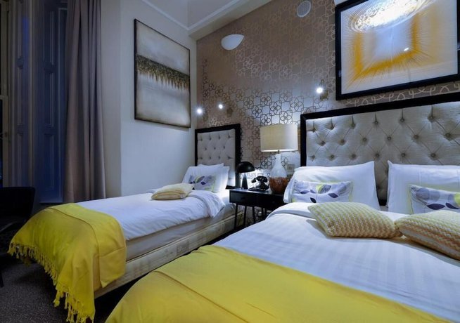 Imagen de la habitación del Hotel Roxford Lodge. Foto 4