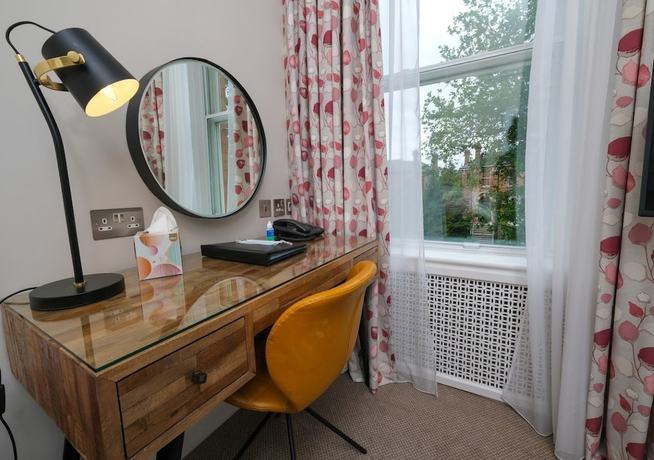 Imagen de la habitación del Hotel Roxford Lodge. Foto 8