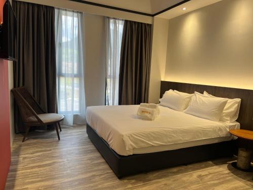 Imagen de la habitación del Hotel Roxy Siniawan. Foto 9