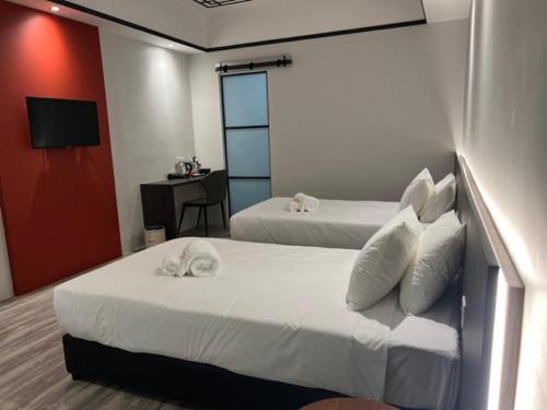 Imagen de la habitación del Hotel Roxy Siniawan. Foto 10