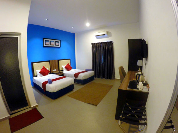 Imagen de la habitación del Hotel Royal Agate Beach Resort. Foto 6