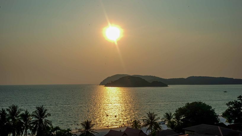 Imagen de la habitación del Hotel Royal Agate Beach Resort. Foto 9