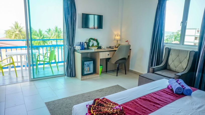 Imagen de la habitación del Hotel Royal Agate Beach Resort. Foto 10