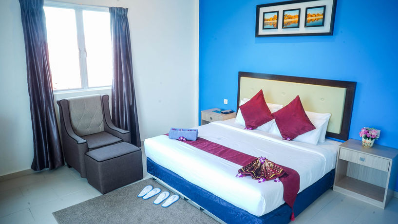 Imagen de la habitación del Hotel Royal Agate Beach Resort. Foto 12