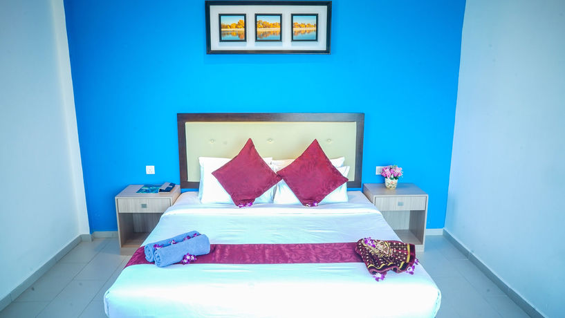 Imagen de la habitación del Hotel Royal Agate Beach Resort. Foto 13