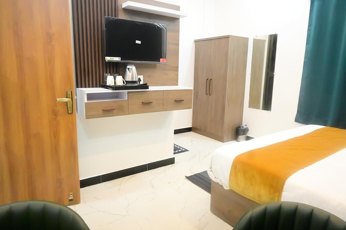 Imagen de la habitación del Hotel Royal Awadh Inn. Foto 12