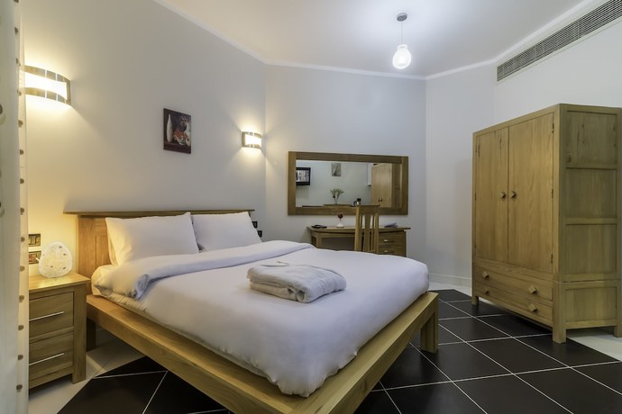 Imagen de la habitación del Hotel Royal Beach Serviced Apartments. Foto 18