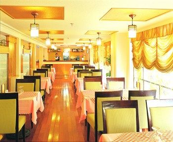 Imagen del bar/restaurante del Hotel Royal Coast Hotel. Foto 2