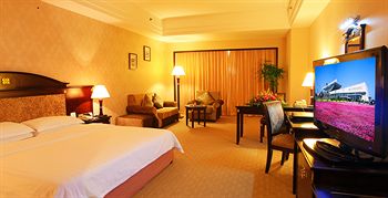 Imagen de la habitación del Hotel Royal Coast Hotel. Foto 11