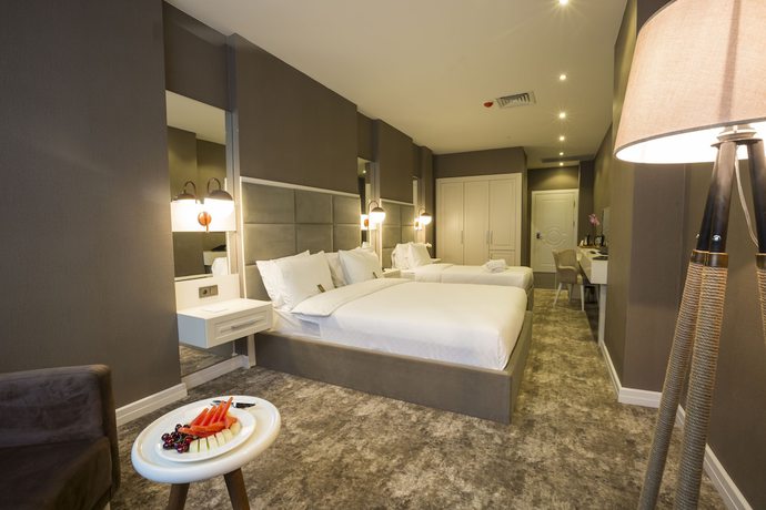 Imagen de la habitación del Hotel Royal Comfort, Araklı. Foto 12