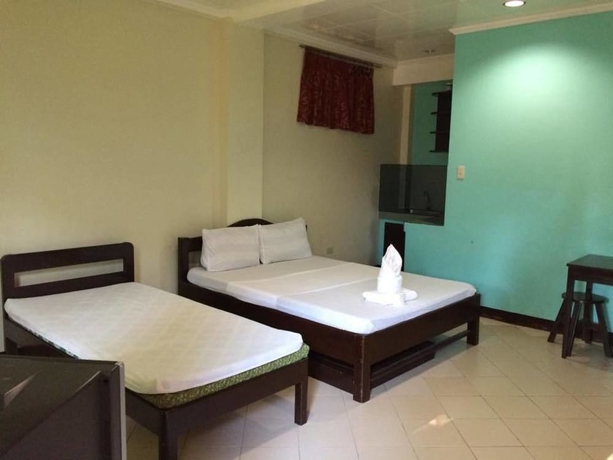 Imagen de la habitación del Hotel Royal Crown Inn. Foto 2